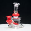 Marty Preston clear glass rig with red trim